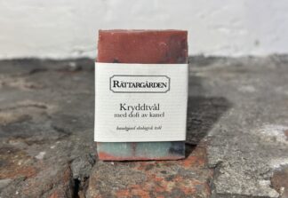 Röd melerad tvål med vit etikett